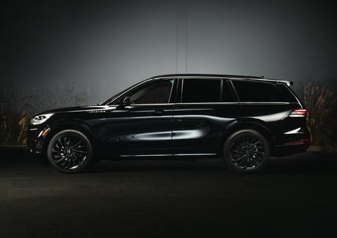A 2024 Lincoln Aviator® SUV is shown in the Infinite Black exterior color | Thornhill Lincoln in Chapmanville WV