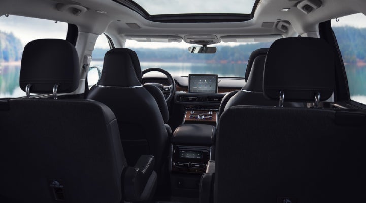 The interior of a 2024 Lincoln Aviator® SUV from behind the second row | Thornhill Lincoln in Chapmanville WV