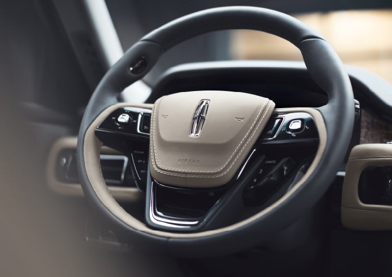 The intuitively placed controls of the steering wheel on a 2024 Lincoln Aviator® SUV | Thornhill Lincoln in Chapmanville WV