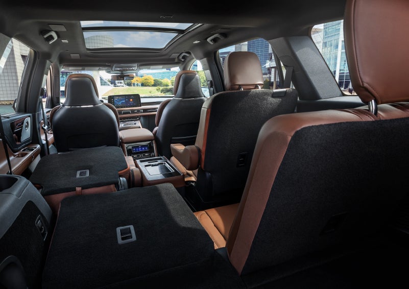 The interior of the 2025 Lincoln Aviator® SUV is shown with two seats folded down for added space. | Thornhill Lincoln in Chapmanville WV