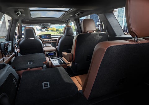 The interior of the 2025 Lincoln Aviator® SUV is shown with two seats folded down for added space. | Thornhill Lincoln in Chapmanville WV