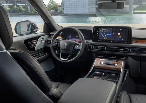 The interior of the 2025 Lincoln Aviator® SUV is shown parked with a view of a harbor through the windshield. | Thornhill Lincoln in Chapmanville WV