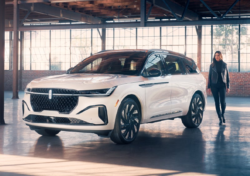 A person approaches a 2025 Lincoln Nautilus® SUV. | Thornhill Lincoln in Chapmanville WV