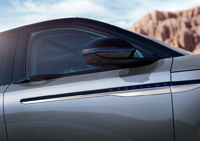 Blue lettering on the side of the vehicle that reads nautilus indicates the available hybrid powertrain. | Thornhill Lincoln in Chapmanville WV