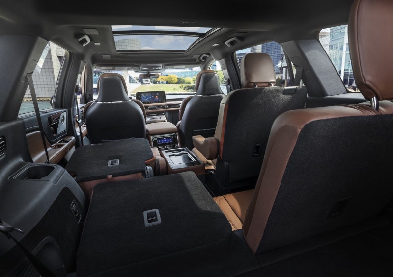 One side of the PowerFold® third-row seat and a second-row seat are folded forward in the 2026 Lincoln Aviator® SUV. | Thornhill Lincoln in Chapmanville WV