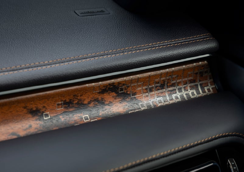 A close-up shot of the 2026 Lincoln Aviator® dashboard with unique black and brown accents and brown stitching. | Thornhill Lincoln in Chapmanville WV