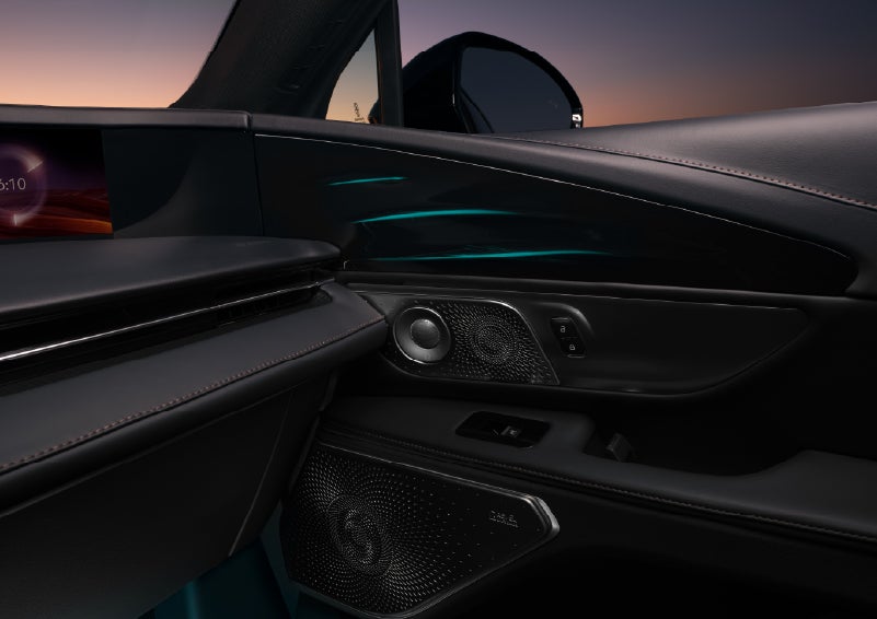 Selectable ambient lighting glows in the passenger door panel. | Thornhill Lincoln in Chapmanville WV