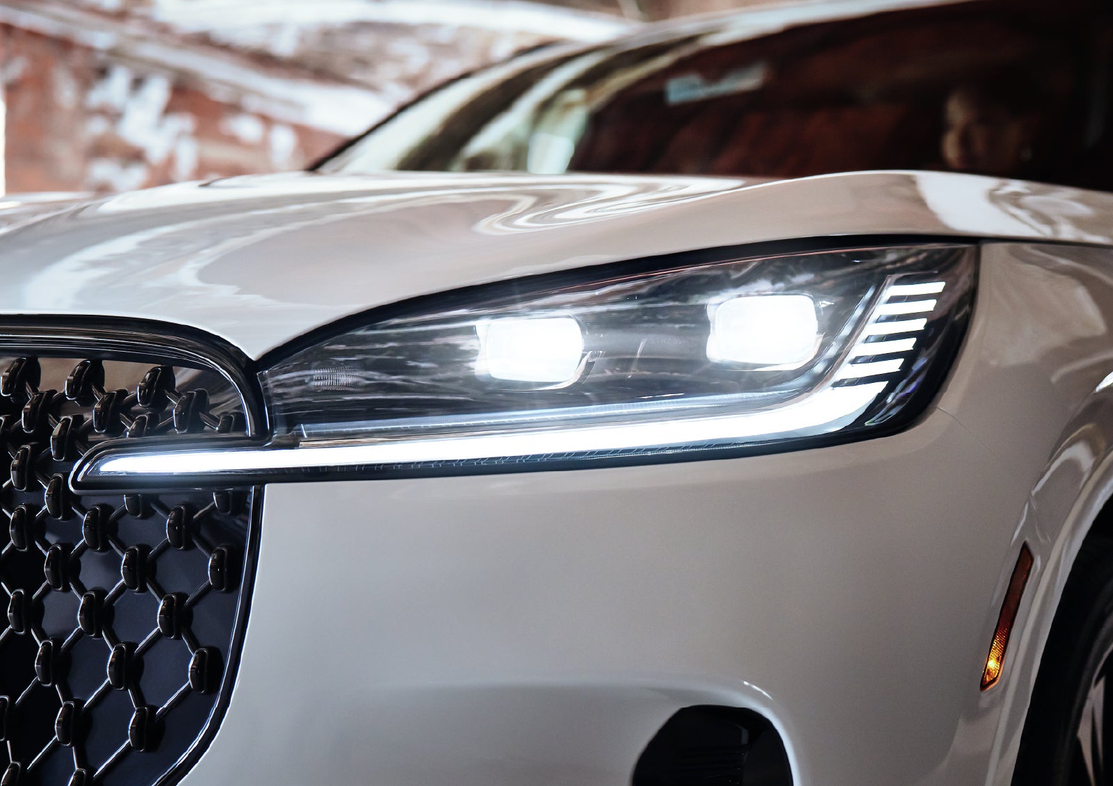 A close-up of a headlamp on the 2027 Lincoln Aviator® SUV is shown. | Thornhill Lincoln in Chapmanville WV